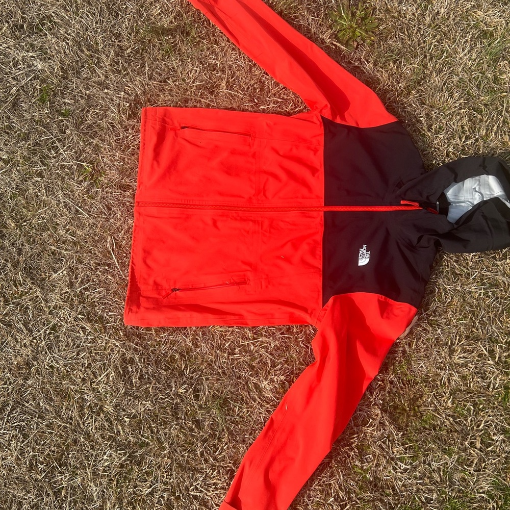 Large Northface rain jacket.